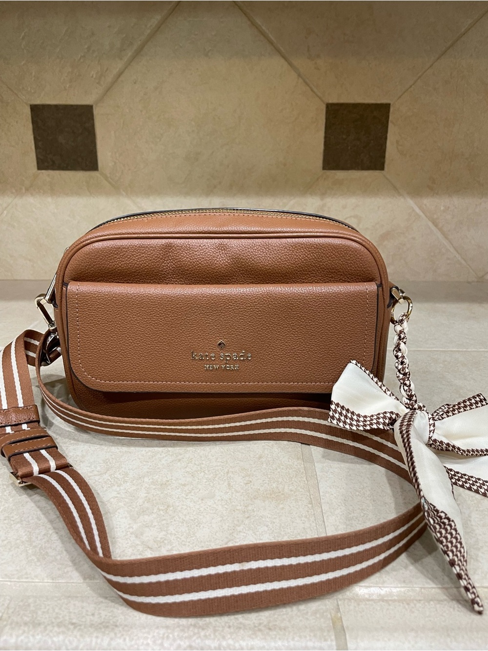 kate spade tan leather crossbody camera bag with striped strap